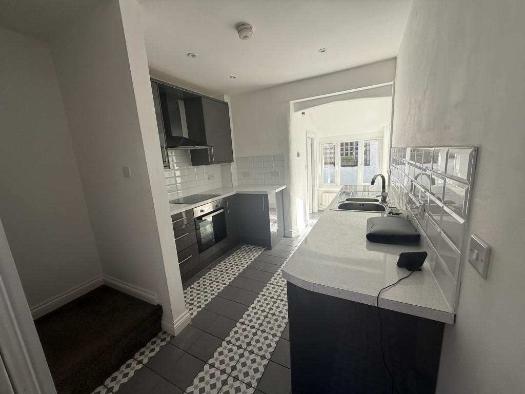 Lot: 99 - REFURBISHED TWO-BEDROOM TERRACED PROPERTY - Kitchen from front door